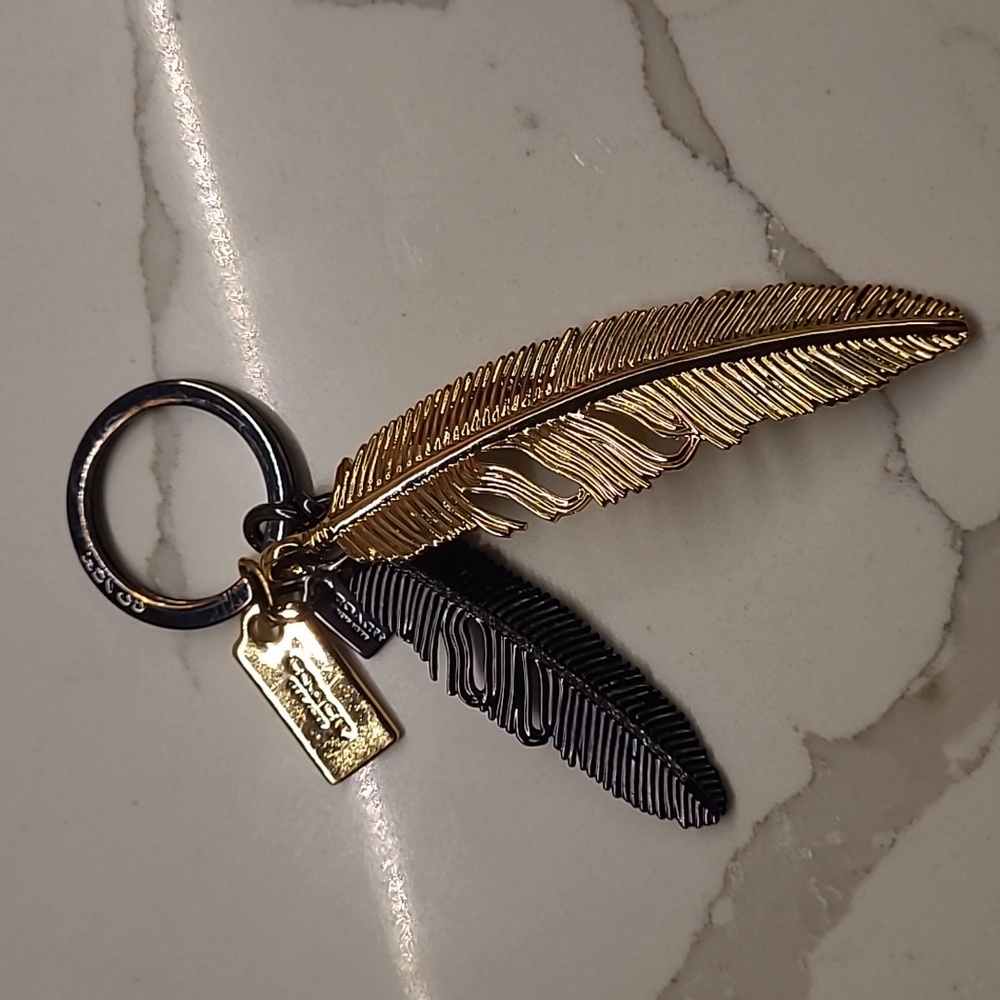 COACH BAG CHARM TAG feather brass